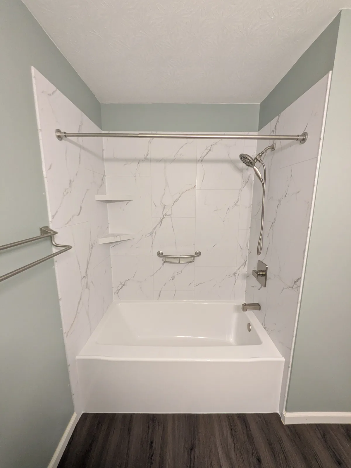 Tub and shower after the remodel, looking toward the glass panel